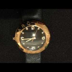 Marc Jacobs gold face and black leather watch